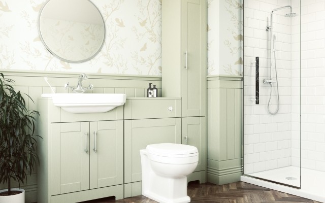 Fitted Unit with Back-to-Wall Toilet, Vanity Basin and a Round Mirror