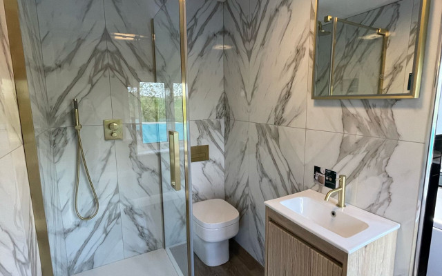 Shower-room-display: A modern and elegant bathroom interior showcasing a stylish shower area.